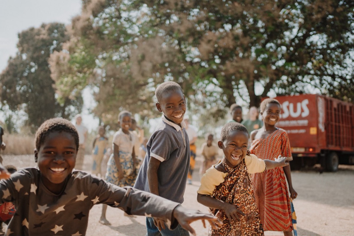 Joyful children dancing outside